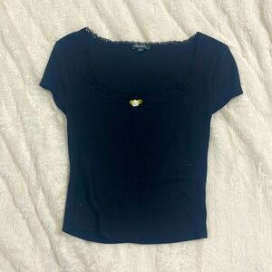 Black shirt with mesh lining with middle flower extra small